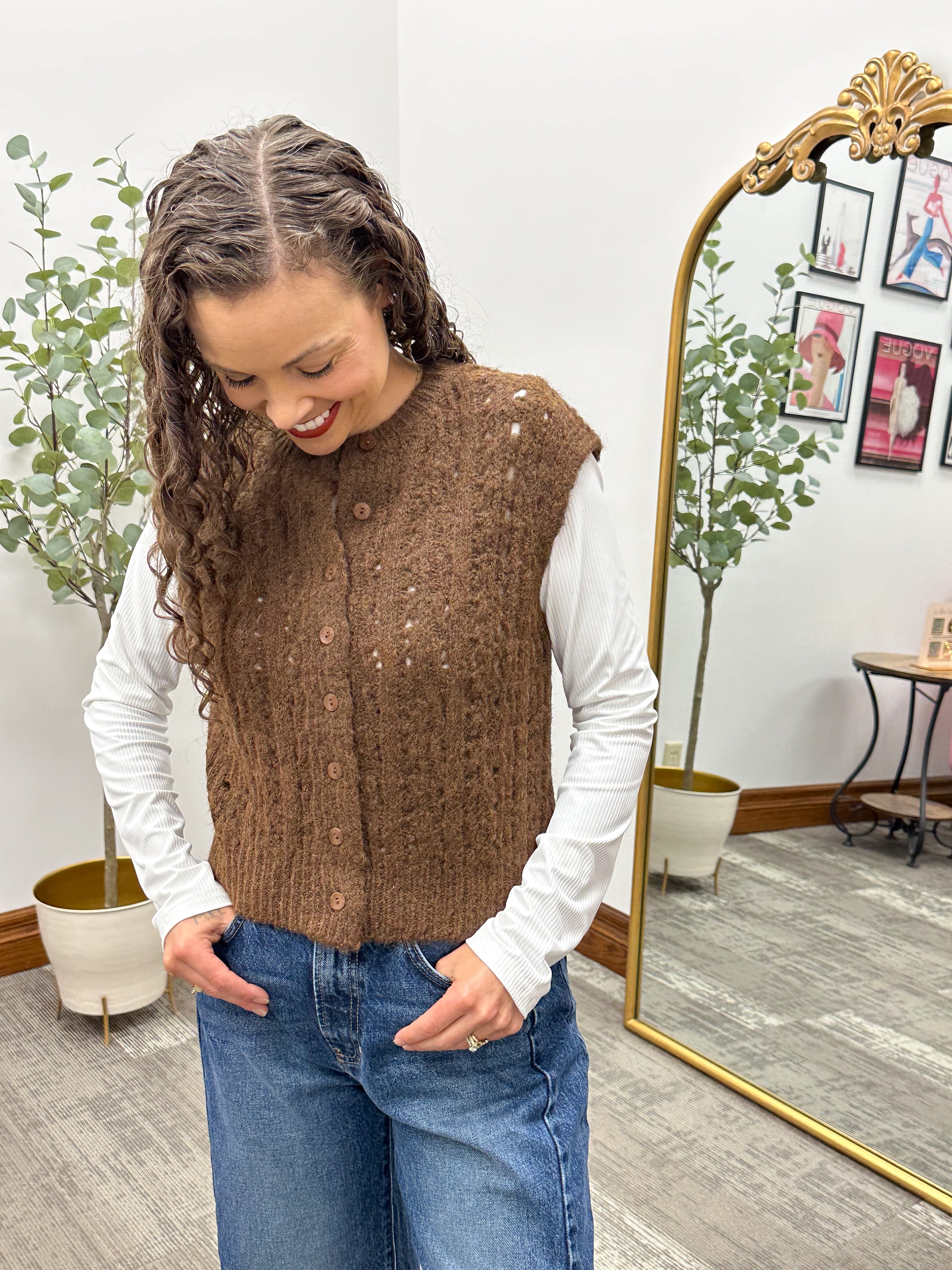 Brown sweater vest
