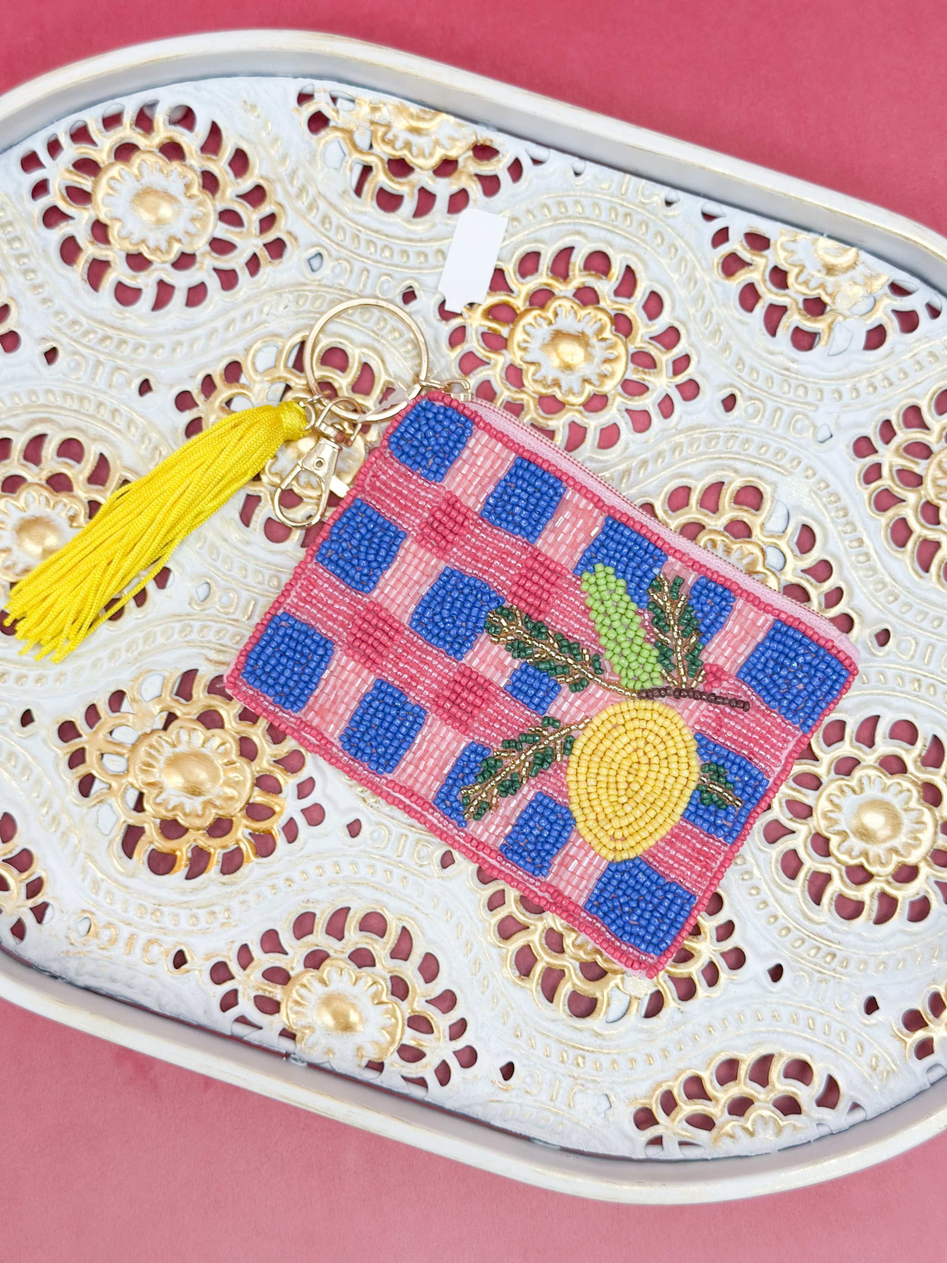 Beaded lemon coin purse with checkered background